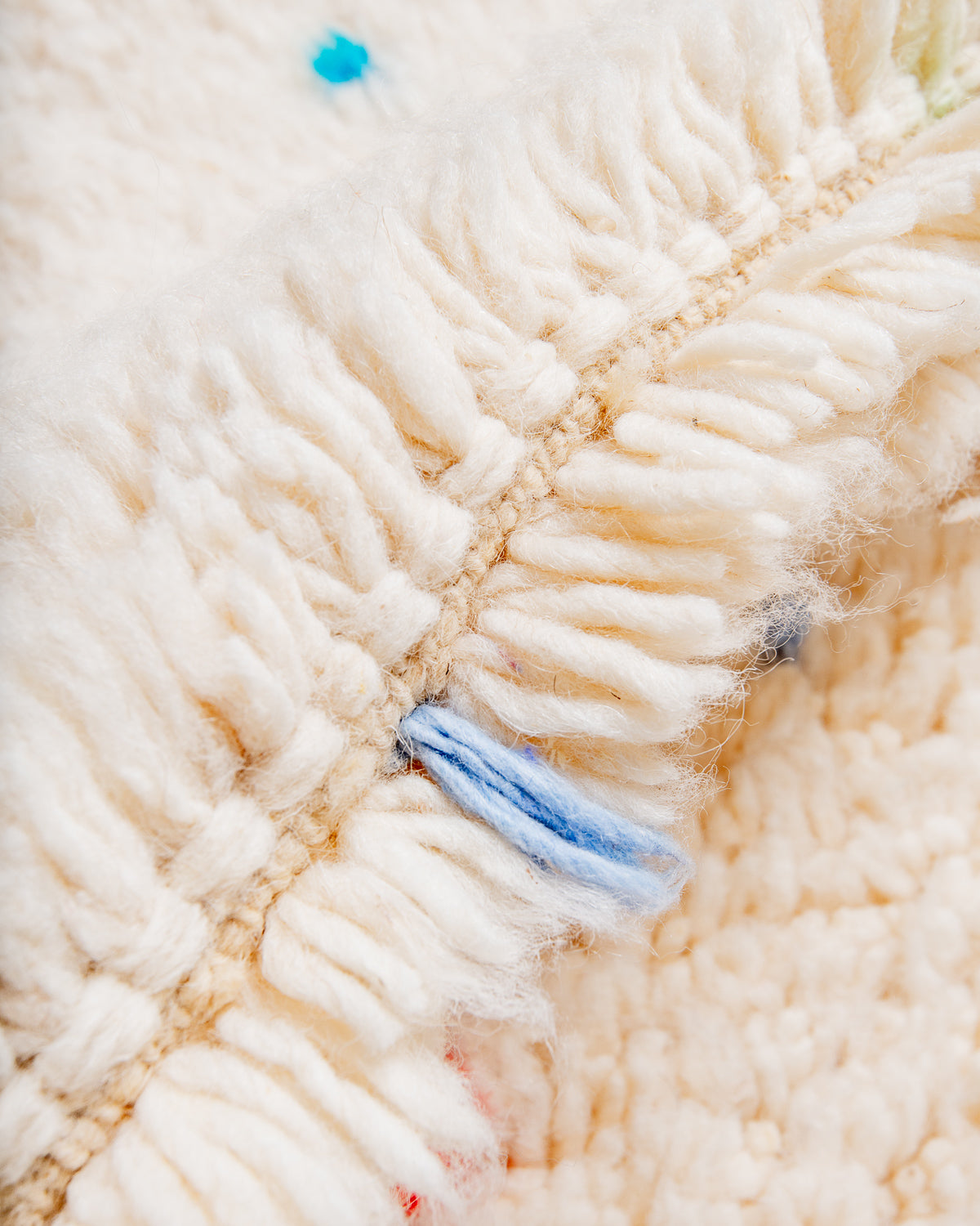 Modern, designer, handcrafted Berber rug from Morocco. Beniourain carpet with beautiful colours and patterns and fluffy wool texture.